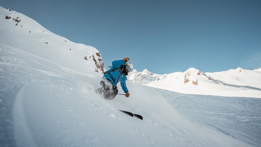 A skier descends in the French Alps.